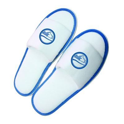 Image of Pair of slippers, open toe, white terry with coloured band and with EVA sole